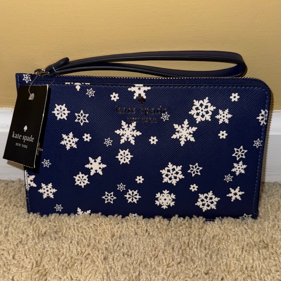 kate spade Blue Wristlet with White Snowflakes